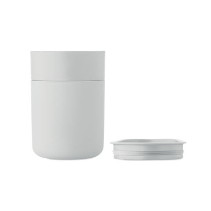 Vaso blanco desmontado con tapa al lado