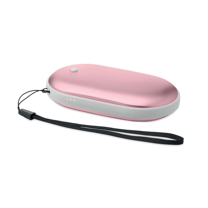Diseño elegante en rosa bebé, calentador de manos eléctrico MUKAVA con batería y cable de carga incluido.