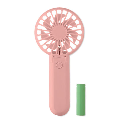Ventilador negro plegado apoyado sobre superficie