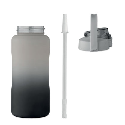 Botella con pajita y tapa desmontada