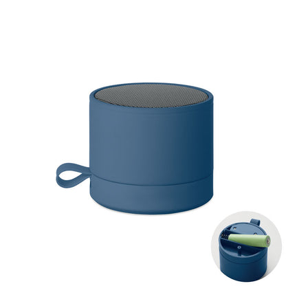 Altavoz Bluetooth azul con batería visible