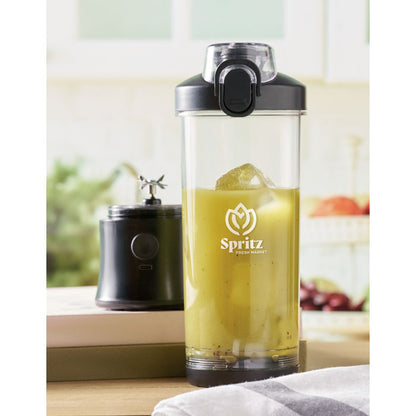 Licuadora portátil 600 ml en cocina con batido amarillo, en uso