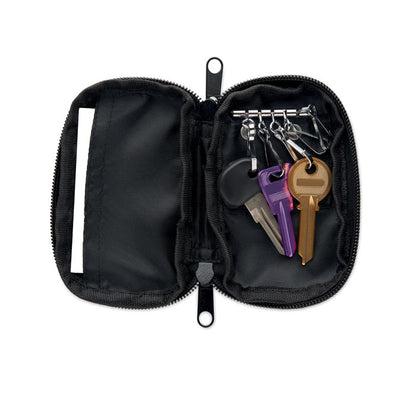 Funda para llaves abierta con llaves en el interior