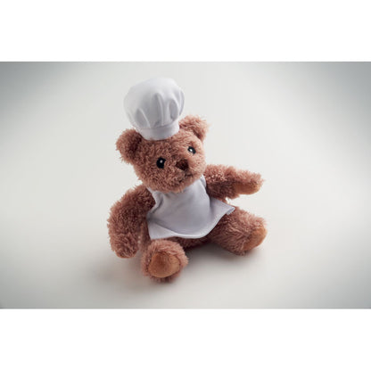Osito de peluche cocinero sobre fondo neutro
