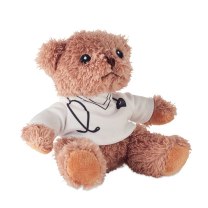 Osito de peluche vestido de médico sentado