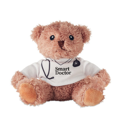 Vista frontal del osito de peluche médico con detalles bordados