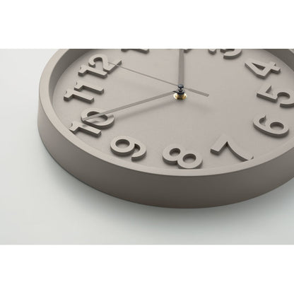 Reloj de pared verde claro, vista en ángulo