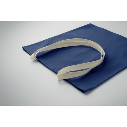 Bolsa de algodón azul marino plegada