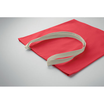 Bolsa de algodón roja plegada