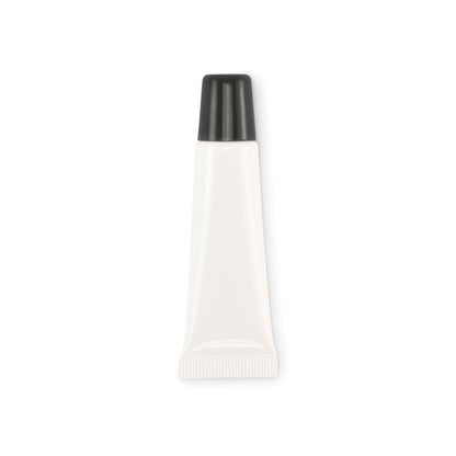 Bálsamo labial vegano en tubo blanco con tapón negro