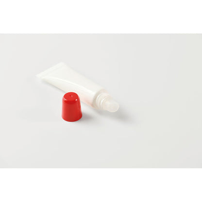 Aplicador de bálsamo labial con tapón rojo