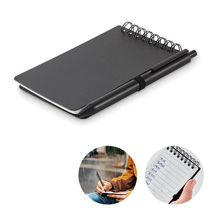 Libreta hidrófuga negra con espiral y bolígrafo