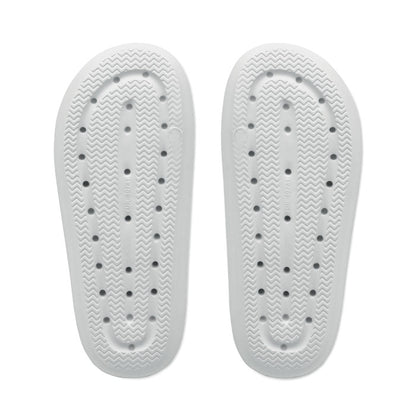 Suela de chanclas blancas con relieve antideslizante