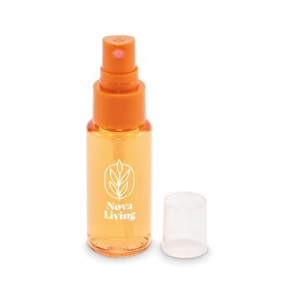 Pulverizador corporal 30 ml PET naranja en ambiente neutro