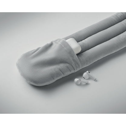 Almohada de viaje enrollable gris plegada