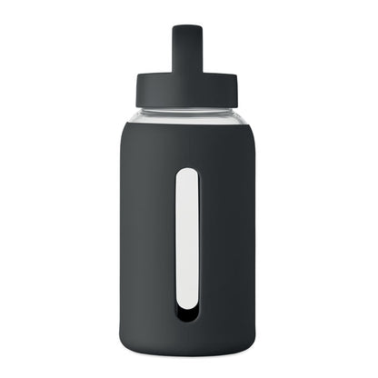 Botella de vidrio con funda negra vista lateral