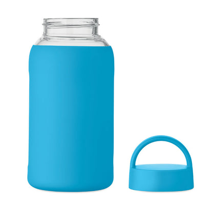 Botella de borosilicato sobre superficie neutra