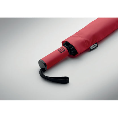 Paraguas rojo cerrado vista lateral