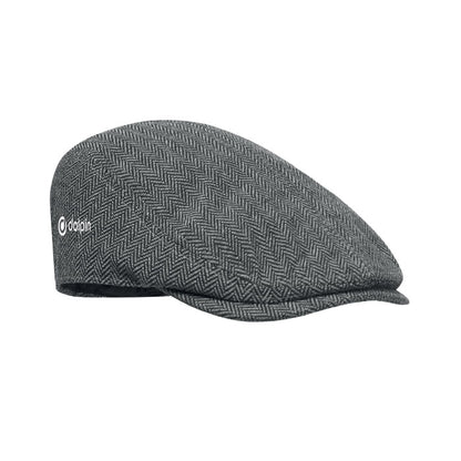 Gorra Newsboy colocada sobre superficie neutra