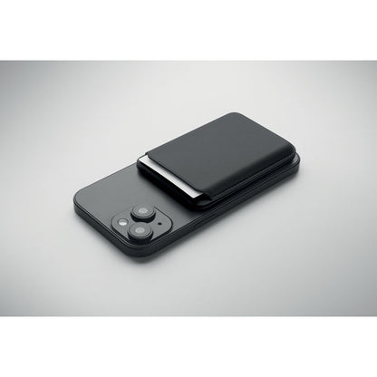 Tarjetero magnético apoyado en superficie vista superior