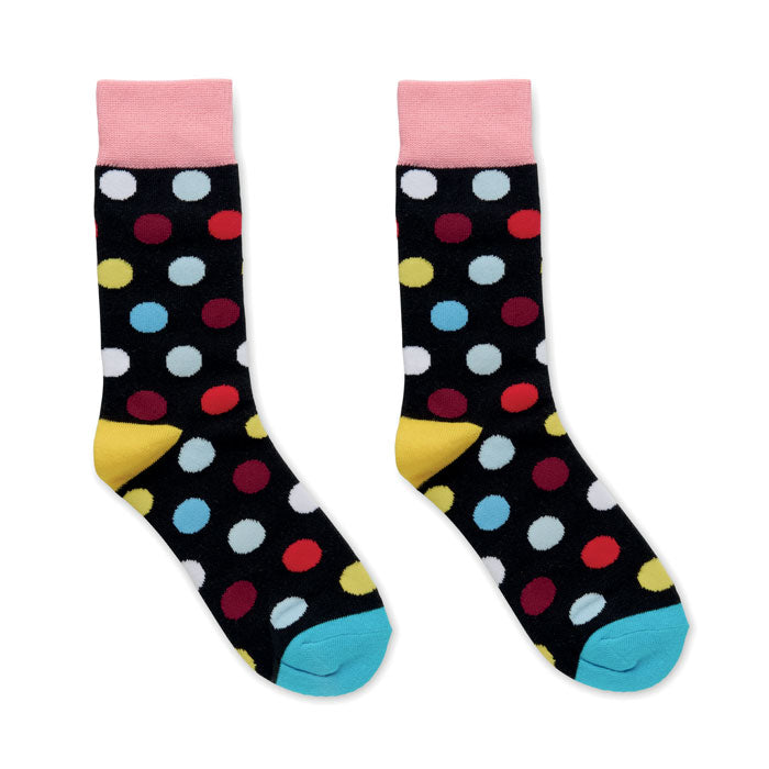 FUNNY M - Calcetines estampados alegres con divertidos diseños de lunares de colores sobre fondo negro.
