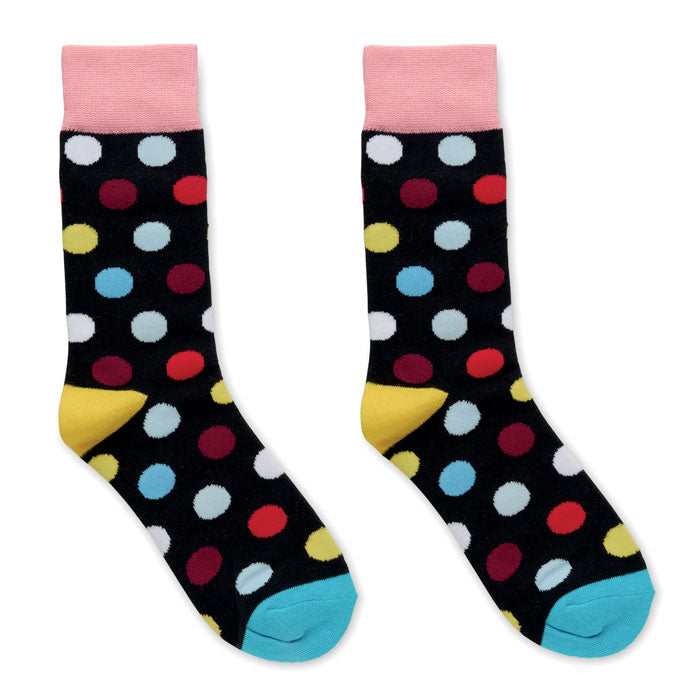 FUNNY L - Calcetines estampados alegres con diseño de puntos de colores sobre fondo negro.