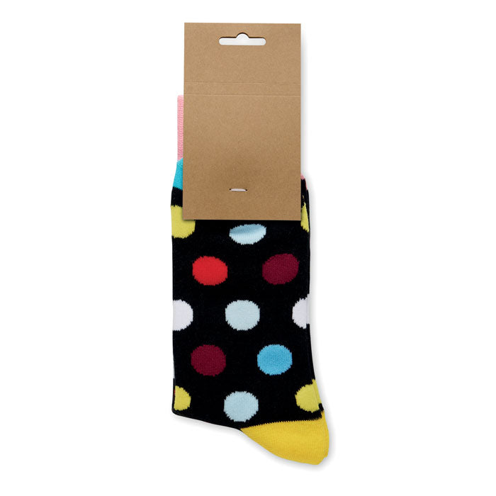 FUNNY L - Calcetines estampados alegres con diseño de lunares de colores sobre fondo negro.