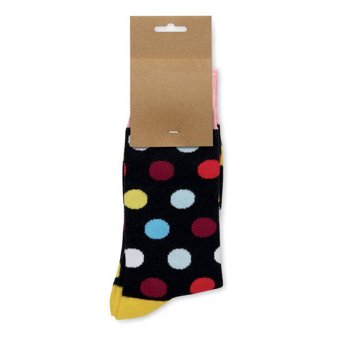 FUNNY L - Calcetines estampados alegres con diseño de círculos coloridos y etiqueta de papel kraft.