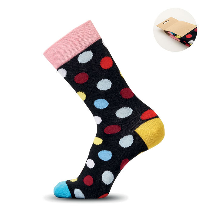 FUNNY L - Calcetines estampados alegres con diseño de lunares coloridos sobre fondo negro.
