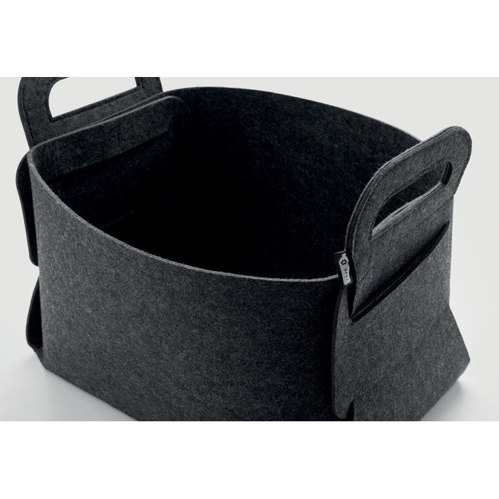 FIALAN - Cesta plegable de fieltro RPET en color gris con asas de transporte, ideal para almacenamiento.