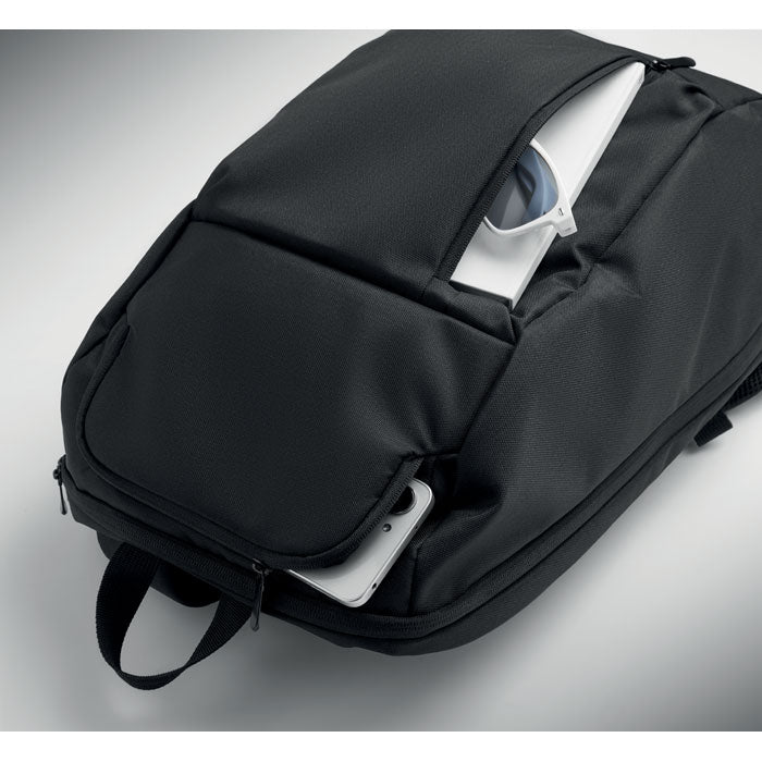 DOHA - Mochila portátil 15" RPET 15L, detalle de cremallera y compartimento principal.