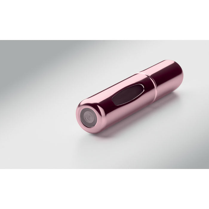 SPRAY - Atomizador recargable de 5 ml en color rosa, diseño elegante y práctico para perfumes.