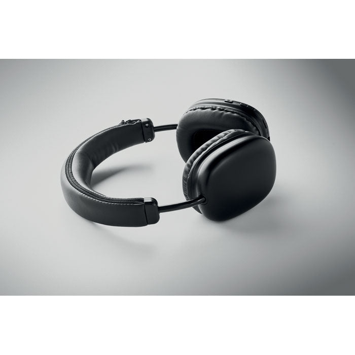 Auriculares inalámbricos SYNC - en negro, diseño elegante y cómodo, ideales para uso diario.