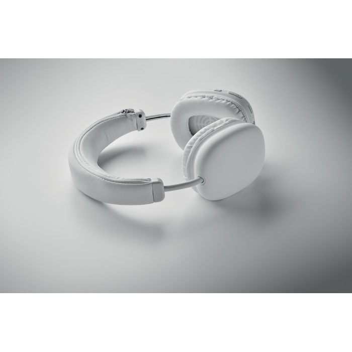 Auriculares inalámbricos SYNC - en color blanco con diseño elegante y comodidad ergonómica.
