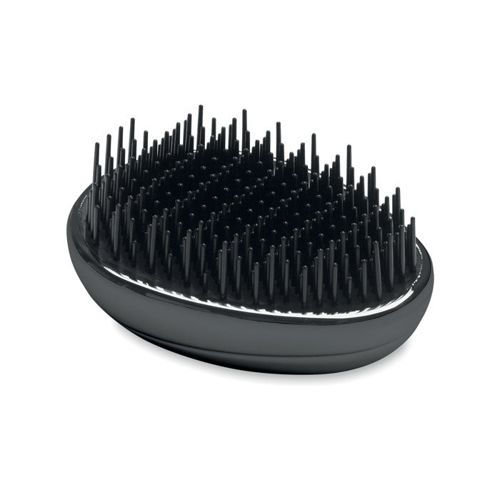 Cepillo antienredos para cabello, diseñado para desenredar suavemente sin dañar el pelo.