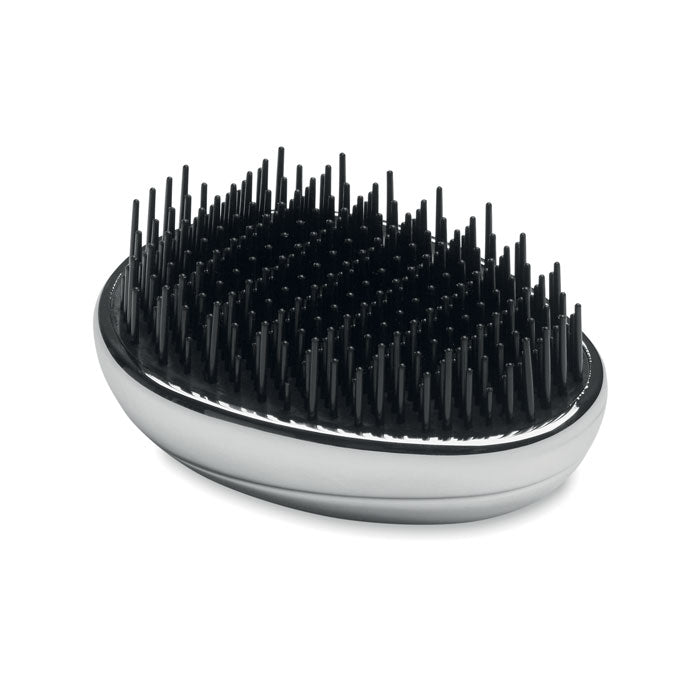Cepillo antienredos para cabello con diseño ergonómico y púas suaves para desenredar sin tirar del cabello.