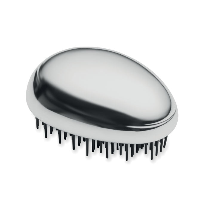 Cepillo antienredos para cabello con diseño ergonómico en ABS y aluminio electrochapado, fácil de usar y suave.