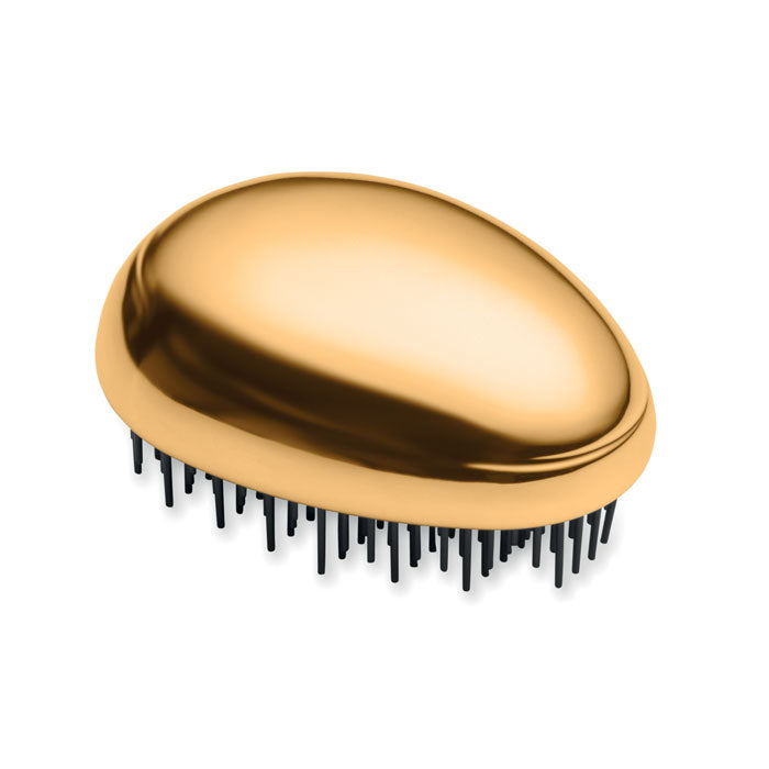 Cepillo antienredos para cabello en color dorado, diseñado para desenredar suavemente sin causar tirones.