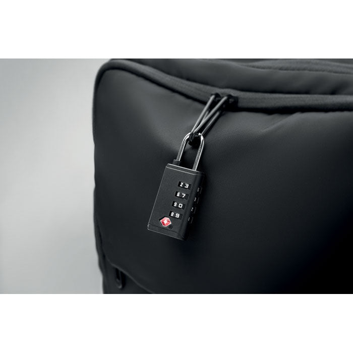 LOCK - Candado TSA 4 dígitos en una mochila negra, mostrando la combinación de 4 dígitos.