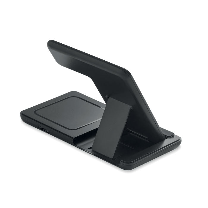 DOCK3 - Cargador plegable 3 en 1 15 W visto desde un ángulo, con soporte y área de carga inalámbrica.