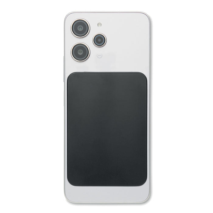 SLIMVOLT - Powerbank ultrafino de 20 W montado en la parte trasera de un teléfono inteligente moderno.