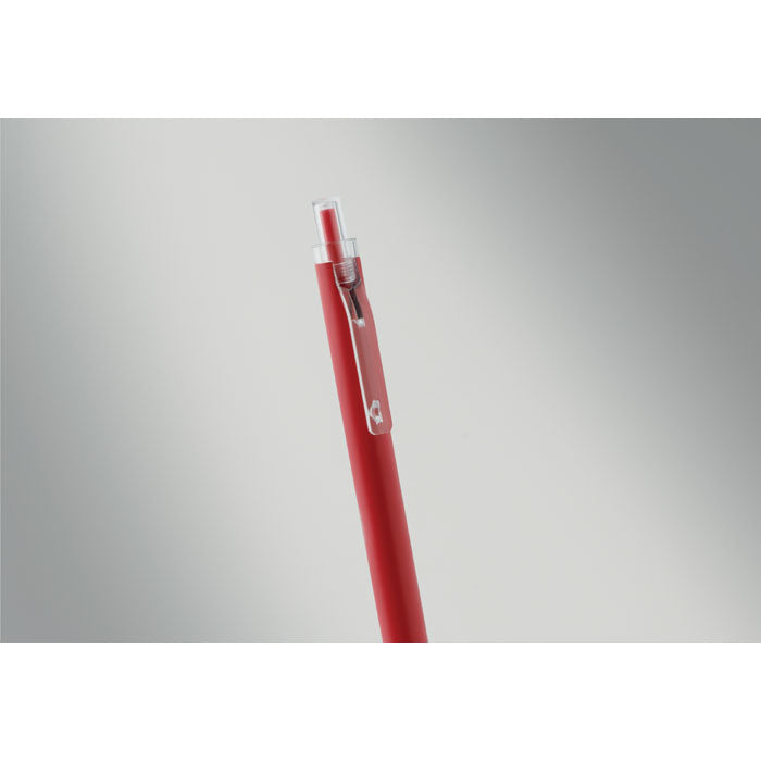 NOSTA - Bolígrafo aluminio reciclado en color rojo con diseño moderno y elegante, vista del clip y punta.