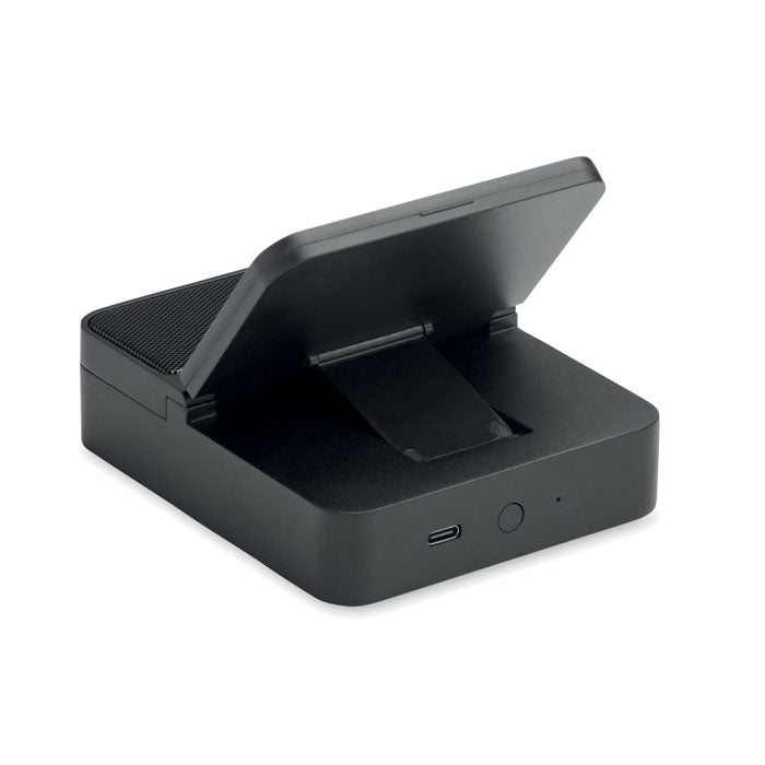 CHARGEBEAT - Altavoz y cargador de 15 W en color negro, con tapa abatible y conexión USB-C.
