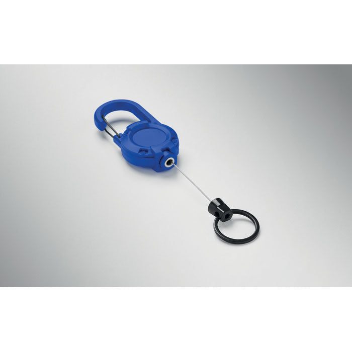 STIBA - Porta credenciales retráctil en color azul con mosquetón y cable de acero extensible de 60 cm.