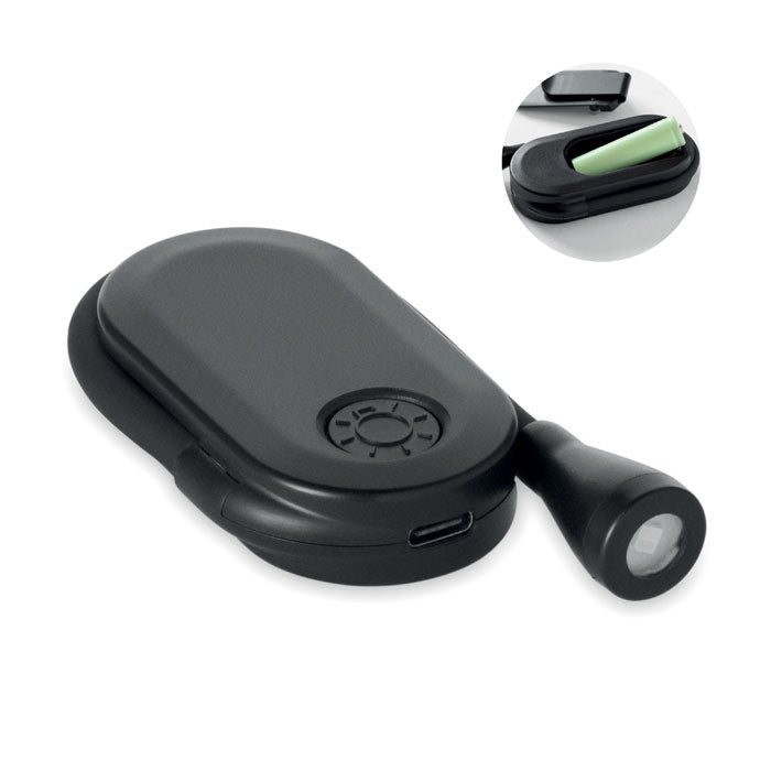 Luz de lectura recargable LED en color negro, con cuerpo flexible y clip para sujetar, ideal para leer en la oscuridad.