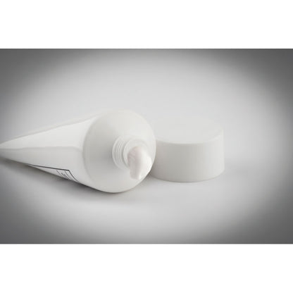 Bote de crema solar pequeño blanco