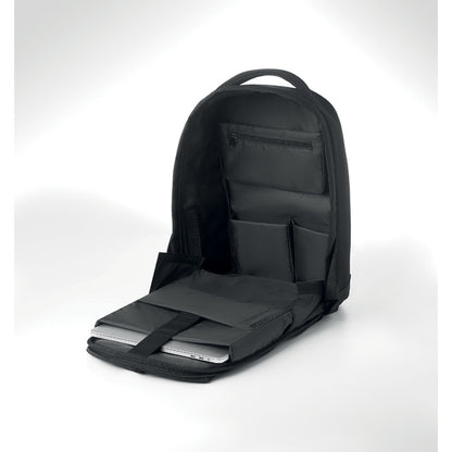 Mochila negra de oficina con cinta trasera para poner sobre trolley de viaje 