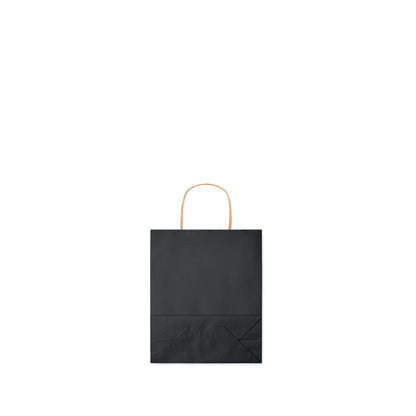 Bolsa negra de papel con fuelle plegado sobre el frontal