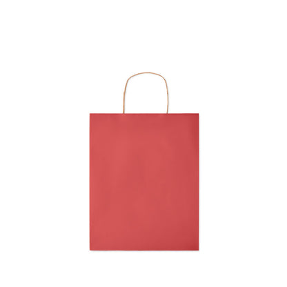 Vista frontal de bolsa de papel roja con asas retorcidas