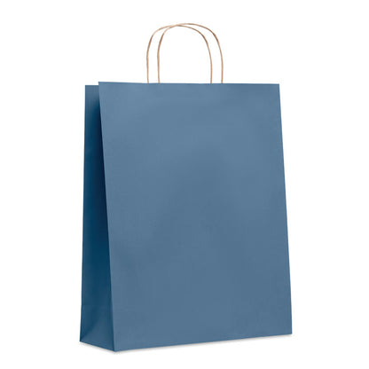 Bolsa azul de papel con fuelle y asas retorcidas
